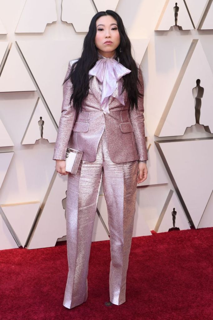 awkwafina in a baby pink sparkly suit